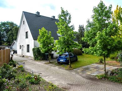 Mehrfamilienhaus zum Kauf 360.000 € 7 Zimmer 150,2 m² 524 m² Grundstück Hatterwüsting I Hatten 26209