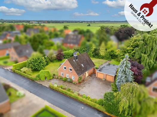 Einfamilienhaus zum Kauf 265.000 € 6 Zimmer 200 m² 1.756 m² Grundstück Uttel Wittmund / Nenndorf 26409