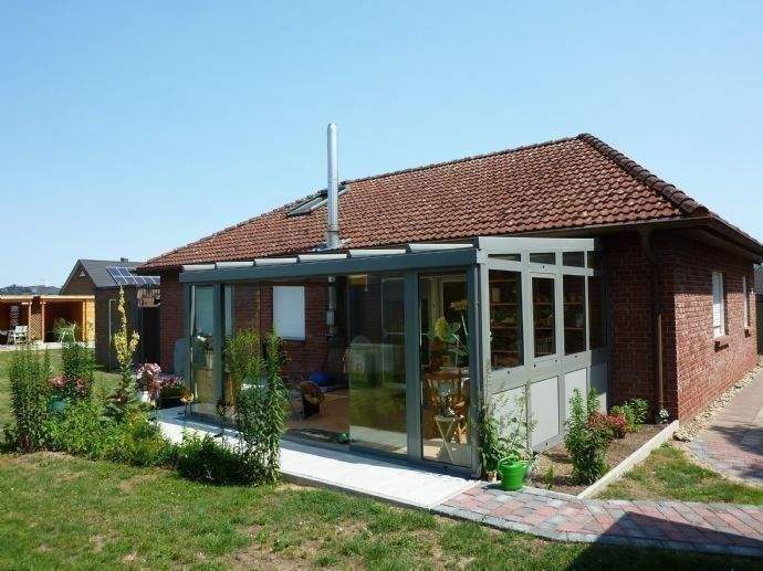 Immobilie in Thomasburg - Barrierefreier Bungalow mit Wintergarten und Kaminofen - Bild 2