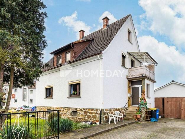 Einfamilienhaus zum Kauf 250.000 € 4 Zimmer 150 m² 618 m² Grundstück Schwalbach Schöffengrund 35641