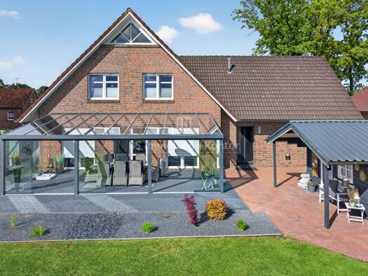 Einfamilienhaus zum Kauf 450.000 € 6 Zimmer 216,6 m² 1.148 m² Grundstück Langholt Ostrhauderfehn 26842