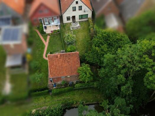 Haus zum Kauf 149.000 € 6 Zimmer 129 m² 317 m² Grundstück Poststraße 37 Neuhaus 21785