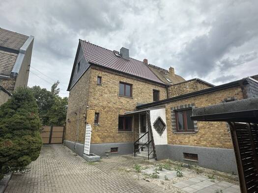 Doppelhaushälfte zum Kauf 159.000 € 4 Zimmer 135 m² 474 m² Grundstück Holzweißig Bitterfeld-Wolfen 06808