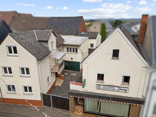 Mehrfamilienhaus zum Kauf 315.000 € 9 Zimmer 204 m² 668 m² Grundstück Mensfelden Hünfelden 65597
