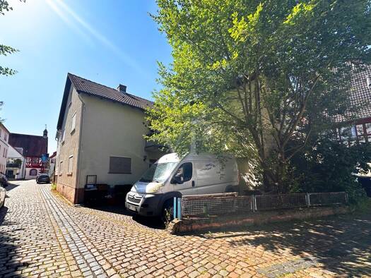 Einfamilienhaus zum Kauf 148.000 € 4 Zimmer 126,1 m² 240 m² Grundstück Wörth am Main 63939