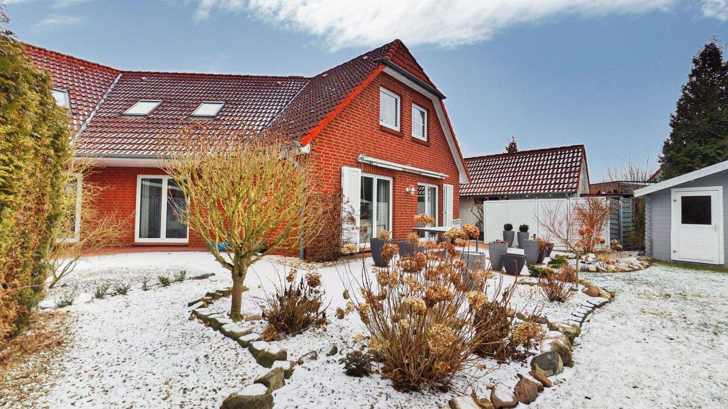 Immobilie in Landesbergen - Doppelhaushälfte mit großzügigem Wohngefühl und liebevoll angelegtem Garten - Bild 2