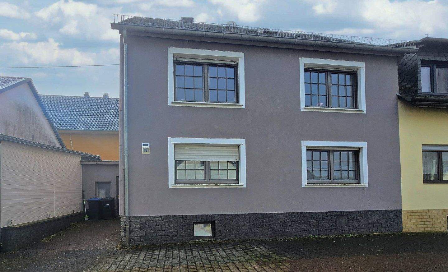 Immobilie in Hermeskeil - Charmante Doppelhaushälfte - vermietet und voller Möglichkeiten - Bild 1