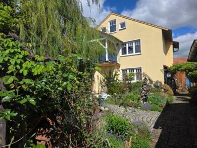 Einfamilienhaus zum Kauf 395.000 € 8 Zimmer 210,4 m² 687 m² Grundstück Waigolshausen Waigolshausen 97534