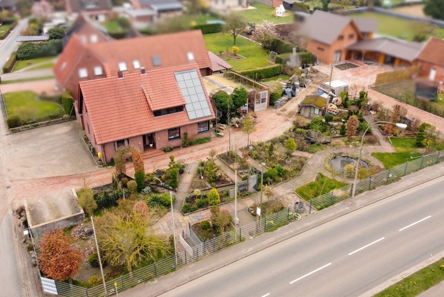 Immobilie in Badbergen - Nachhaltiges Einfamilienhaus mit Lagerhalle auf großem Grundstück! - Bild 1