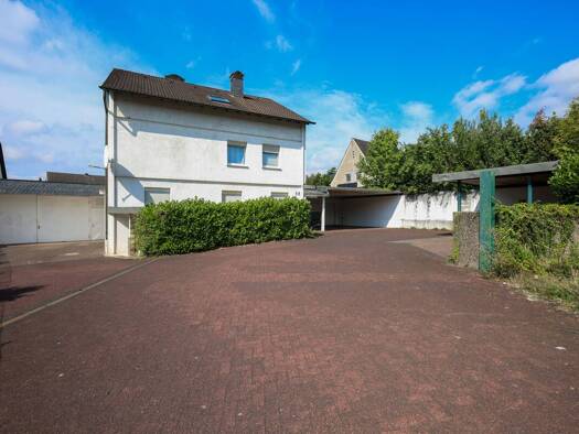 Mehrfamilienhaus zum Kauf als Kapitalanlage geeignet 950.000 € 16 Zimmer 402,3 m² 1.457 m² Grundstück Wiescheid Langenfeld (Rheinland) 40764