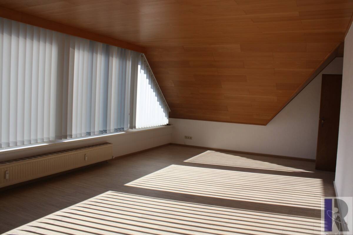 Immobilie in Saffig - Wohnen wie im eigenen Haus - Eigentumswohnung mit Garten und Garage - Bild 1