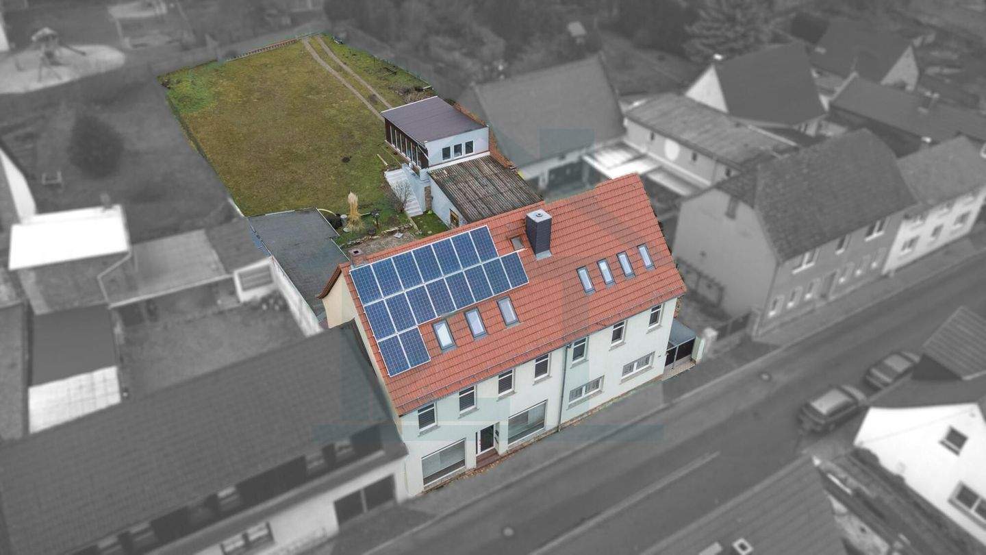 Immobilie in Bad Sulza - Vielseitiges Mehrfamilienhaus mit fünf Wohneinheiten und großem Grundstück in Bad Sulza - Bild 2