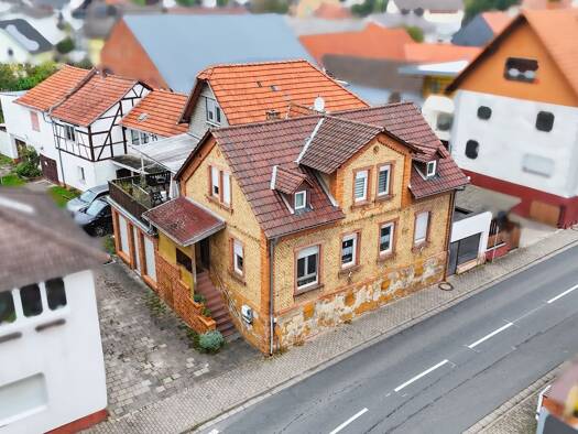 Mehrfamilienhaus zum Kauf 385.000 € 12 Zimmer 300 m² 680 m² Grundstück Niedermittlau Hasselroth 63594