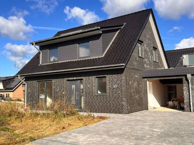 Einfamilienhaus zum Kauf 419.000 € 4 Zimmer 128 m² 380 m² Grundstück Dorum Wurster Nordseeküste 27639