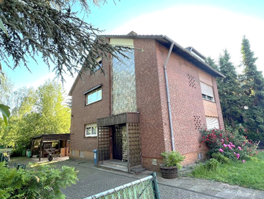 Mehrfamilienhaus zum Kauf 365.000 € 6 Zimmer 215 m² 1.033 m² Grundstück Holten Oberhausen 46147