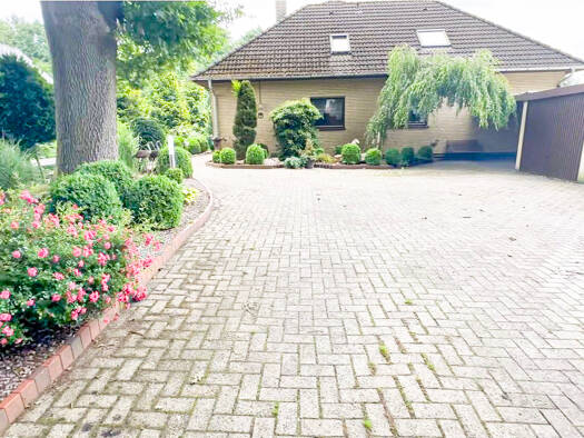 Mehrfamilienhaus zum Kauf 375.000 € 8 Zimmer 192 m² 1.720 m² Grundstück Groß Ippener 27243