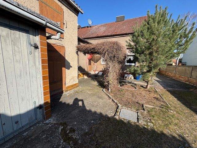 Immobilie in Stendal - Doppelhaushälfte mit großem Grundstück, Garage und vielseitigen Erweiterungsmöglichkeiten - Bild 2