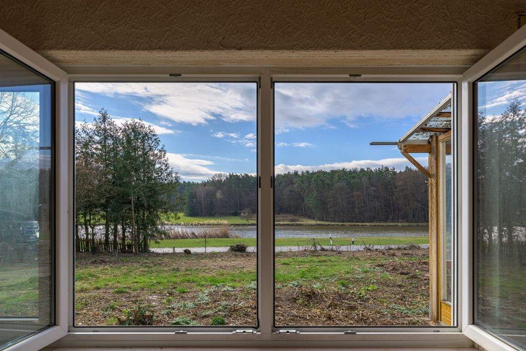 Immobilie in Weisendorf - Unverbaubarer Blick ins Grüne auf großem Grundstück - Bild 1