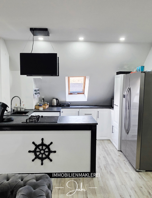 Immobilie in Elfershausen - Modernisiertes Mehrfamilienhaus als Renditeobjekt oder für Mehrgenerationen - Bild 4