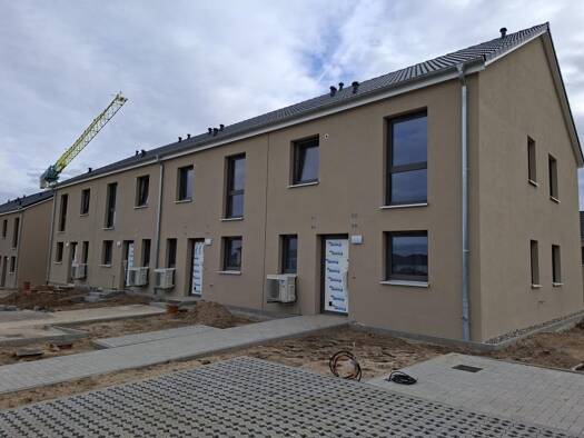 Reihenendhaus zur Miete - Erstbezug 1.500 € 4 Zimmer 106,8 m² Sonnenblumenweg 17 Tessin 18195