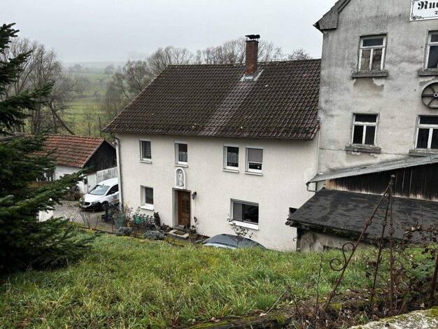 Einfamilienhaus zum Kauf 180.000 € 7,5 Zimmer 200 m² 5.170 m² Grundstück Geroda 97779