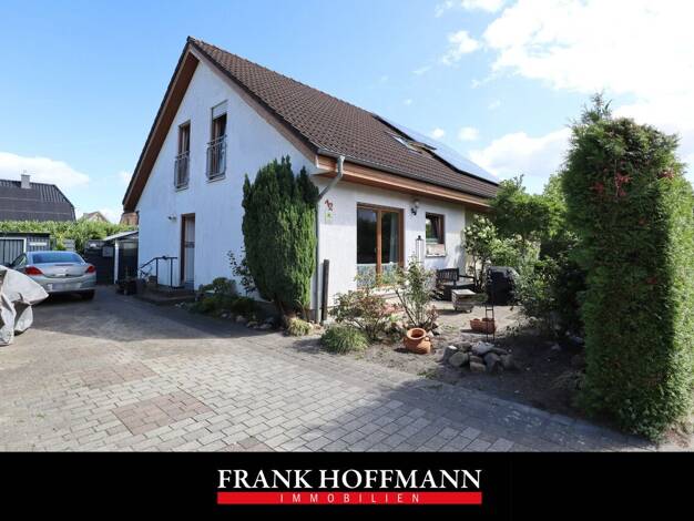 Einfamilienhaus zum Kauf 670.000 € 7,5 Zimmer 180,3 m² 518 m² Grundstück Kölln-Reisiek 25337
