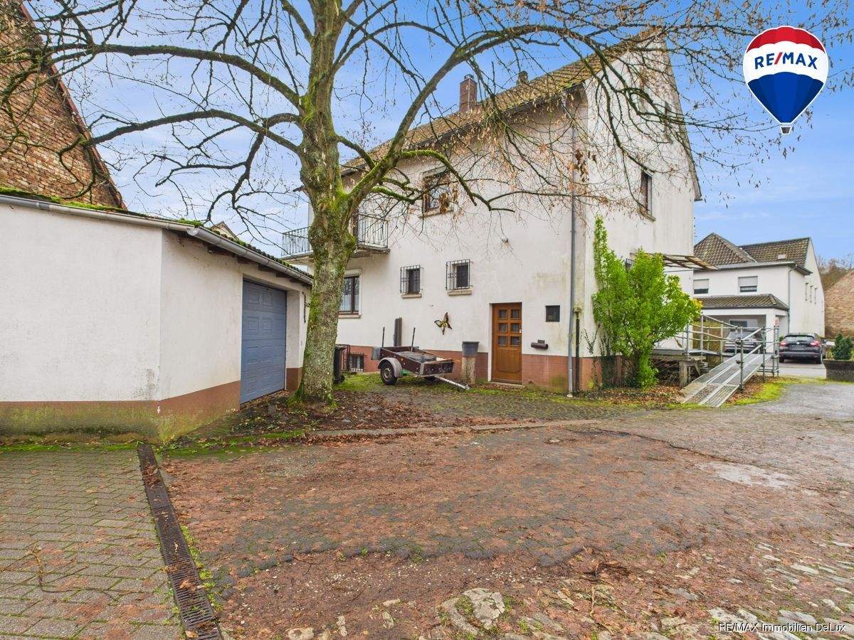Immobilie in Blieskastel - Raum für Ideen: Einfamilienhaus mit Potenzial in Blieskastel-Breitfurt - Bild 1