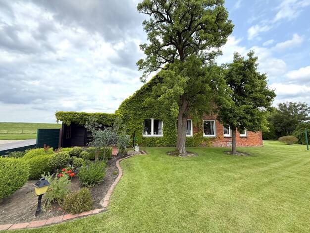 Mehrfamilienhaus zum Kauf 245.000 € 7 Zimmer 249 m² 1.222 m² Grundstück Langlütjenstr. 213 Tettens Nordenham 26954