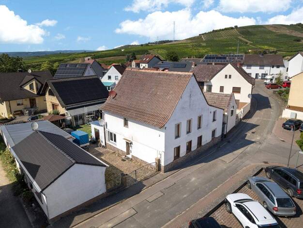 Einfamilienhaus zum Kauf 280.000 € 9 Zimmer 292,2 m² 519 m² Grundstück Aspisheim 55459