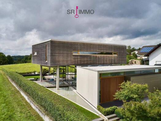 Einfamilienhaus zum Kauf 1.100.000 € 8 Zimmer 260 m² 2.500 m² Grundstück Weiskirchen 66709