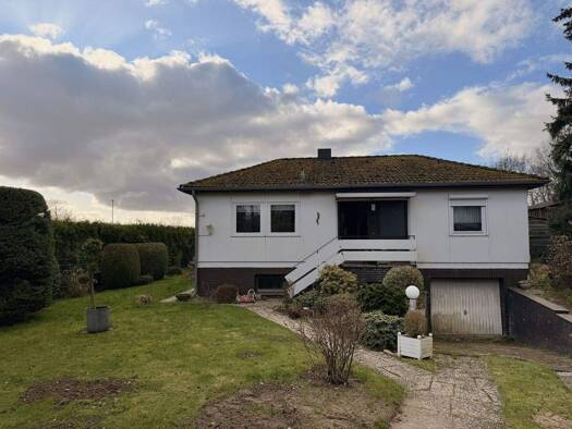 Einfamilienhaus zum Kauf 300.000 € 3 Zimmer 102 m² 869 m² Grundstück Kabenweg 5 Langenrehm Rosengarten 21224