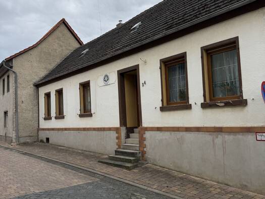 Einfamilienhaus zum Kauf 69.000 € 4 Zimmer 94 m² 1.073 m² Grundstück Cochstedt Hecklingen 39444