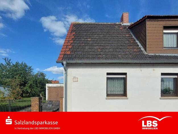 Doppelhaushälfte zum Kauf 68.000 € 4 Zimmer 76 m² 1.134 m² Grundstück frei ab 01.05.2026 Staßfurt 39418