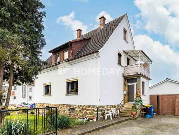 Einfamilienhaus zum Kauf 250.000 € 4 Zimmer 150 m² 618 m² Grundstück Schwalbach Schöffengrund 35641