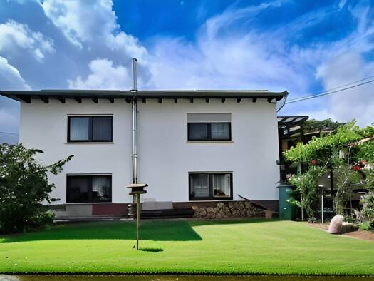 Einfamilienhaus zum Kauf 330.000 € 9 Zimmer 245 m² 639 m² Grundstück Langsdorf Lich 35423