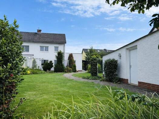 Doppelhaushälfte zum Kauf 540.000 € 6 Zimmer 124 m² 443 m² Grundstück Okriftel Hattersheim 65795