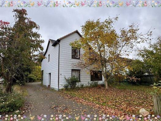 Mehrfamilienhaus zum Kauf 395.000 € 8 Zimmer 227,5 m² 1.514 m² Grundstück Kummerfeld 25495