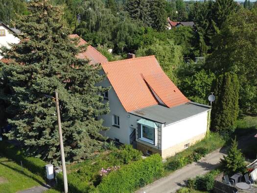 Einfamilienhaus zum Kauf 299.000 € 5 Zimmer 92,4 m² 1.070 m² Grundstück Taucha 04425