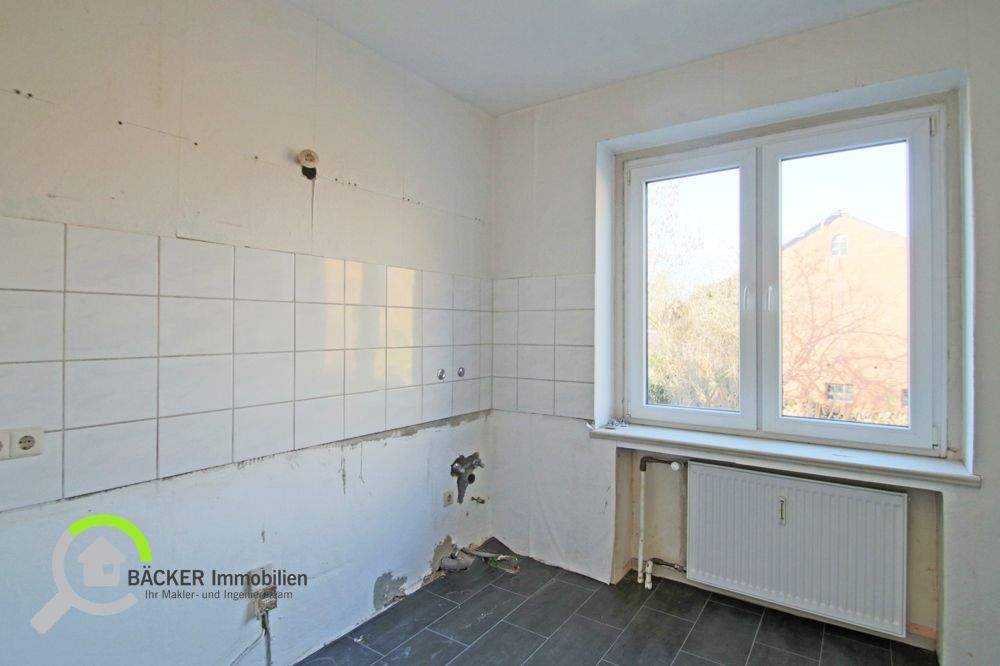 Immobilie in Lemförde - Vielseitiges Wohn- und Geschäftshaus mit Garten und Garage in zentraler Lage von Lemförde - Bild 4
