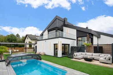 Einfamilienhaus zum Kauf 2.199.000 € 10 Zimmer 385,2 m² 855 m² Grundstück Rodheim-Bieber Biebertal 35444