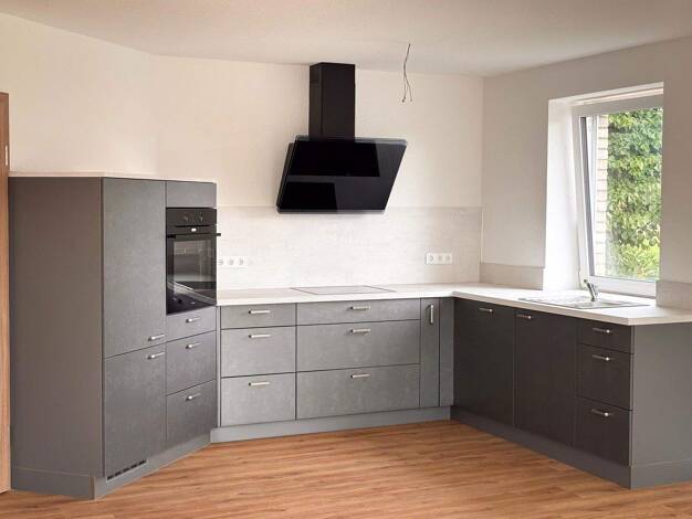 Wohnung zur Miete - Erstbezug 945 € 2 Zimmer 74 m² 1. Geschoss frei ab sofort Hauptstr. 27 Groß Rheide 24872