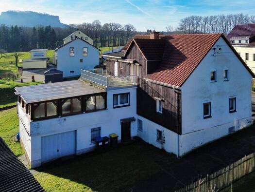 Mehrfamilienhaus zum Kauf 195.000 € 7 Zimmer 200 m² 2.049 m² Grundstück frei ab sofort Waltersdorf Bad Schandau 01814