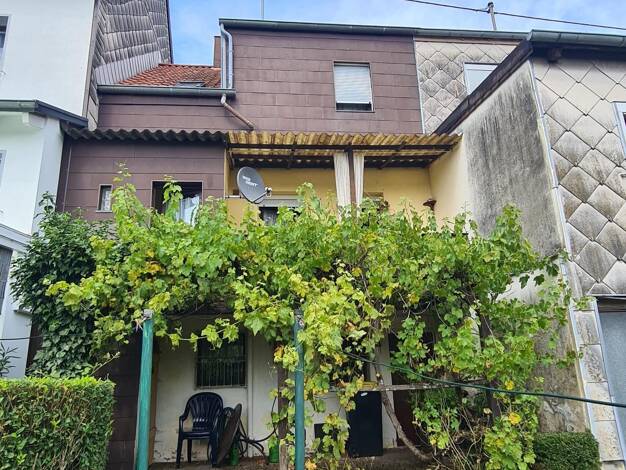 Reihenmittelhaus zum Kauf 82.500 € 5 Zimmer 94 m² 192 m² Grundstück Heiligenwald Schiffweiler 66578