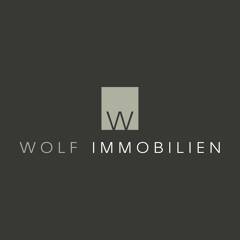 Wolf Immobilien logo