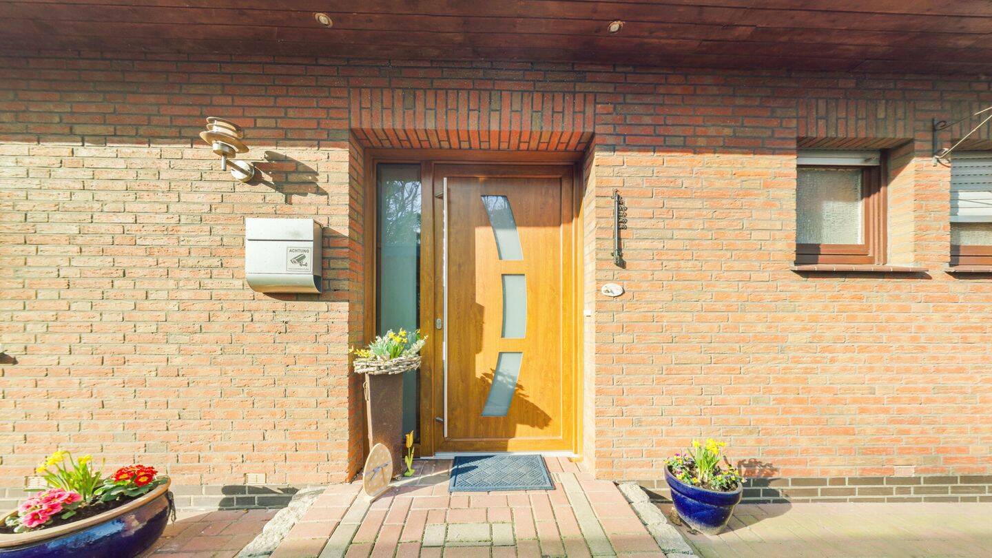 Immobilie in Twistringen - Bungalow mit Garage mitten im Grünen - Bild 1