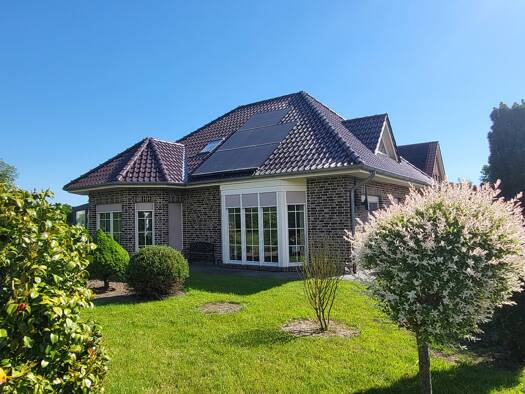 Bungalow zum Kauf 369.000 € 4 Zimmer 141,9 m² 1.125 m² Grundstück Filsum 26849