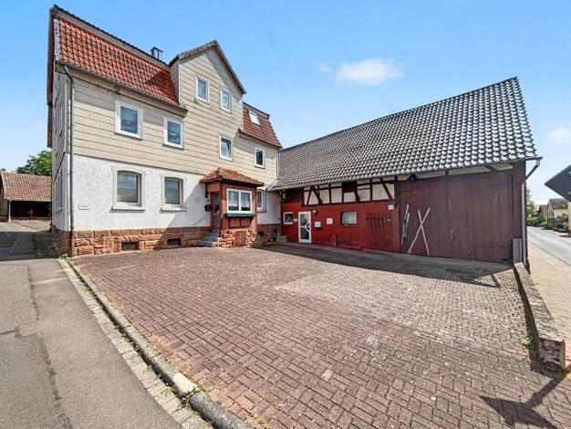 Einfamilienhaus zum Kauf 315.000 € 9 Zimmer 301 m² 1.716 m² Grundstück Sandlofs Schlitz 36110