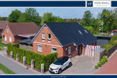 Einfamilienhaus zum Kauf 315.000 € 5 Zimmer 120 m² 1.562 m² Grundstück Upgant-Schott Upgant-Schott 26529