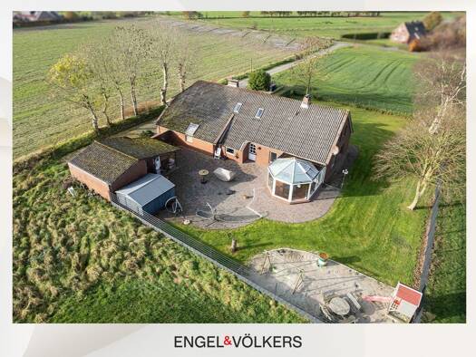 Einfamilienhaus zum Kauf 519.000 € 10 Zimmer 252 m² 1.496 m² Grundstück Buttforde Wittmund 26409