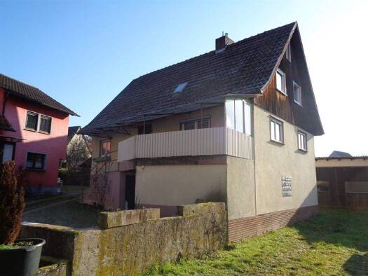 Einfamilienhaus zum Kauf 145.000 € 5,5 Zimmer 92 m² 970 m² Grundstück Reicholzheim Wertheim-Reicholzheim 97877